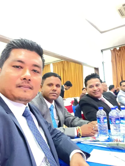 Leaders seated together during the kickoff session